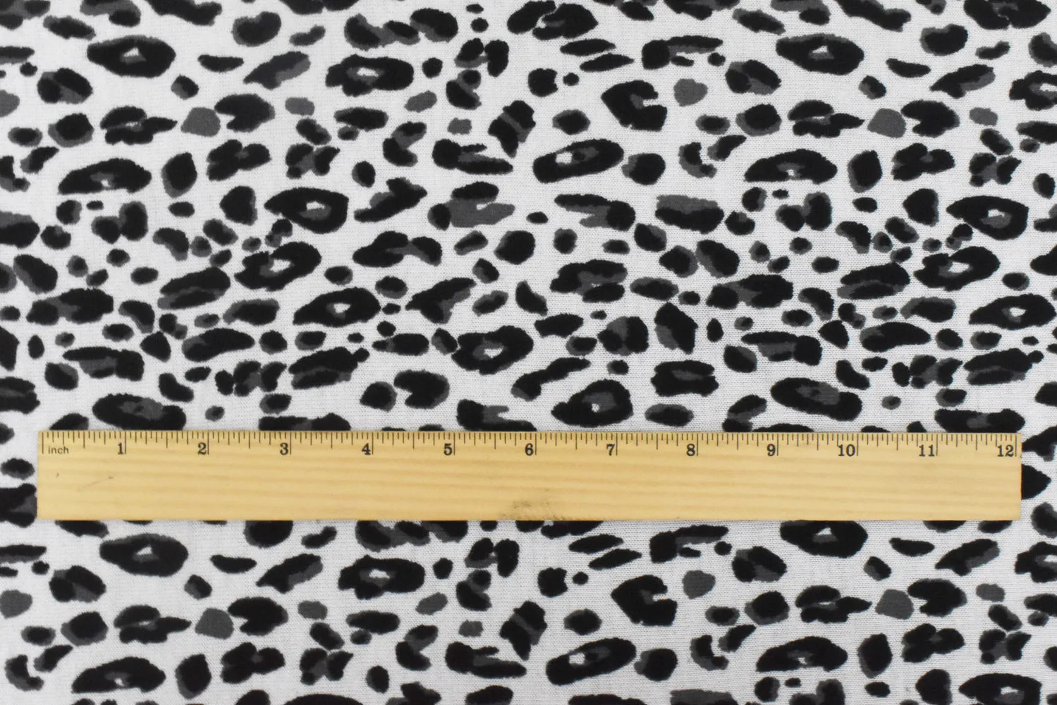 Simple Black-White-Gray Cheetah Printed Stretch Poly Jersey Knit Fabric